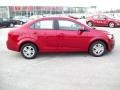 2012 Crystal Red Tintcoat Chevrolet Sonic LS Sedan  photo #3