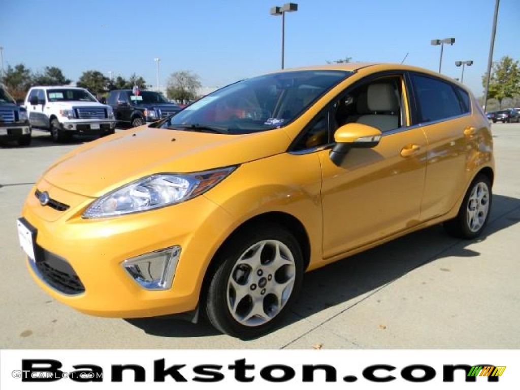 2011 Fiesta SES Hatchback - Yellow Blaze Metallic Tri-Coat / Cashmere/Charcoal Black Leather photo #1