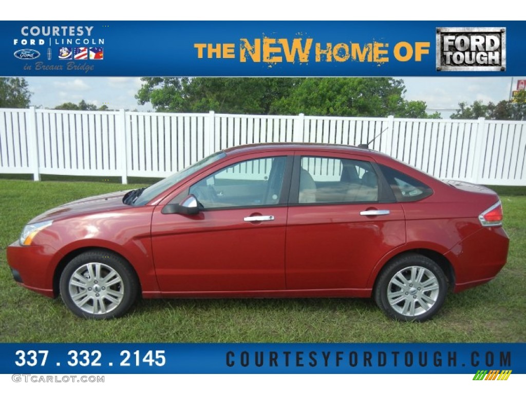 2010 Focus SEL Sedan - Sangria Red Metallic / Medium Stone photo #1