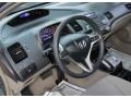 Beige 2009 Honda Civic Hybrid Sedan Steering Wheel