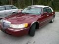 1998 Cordovan Red Metallic Lincoln Town Car Executive  photo #1