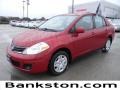 Red Brick Metallic 2010 Nissan Versa 1.8 S Sedan