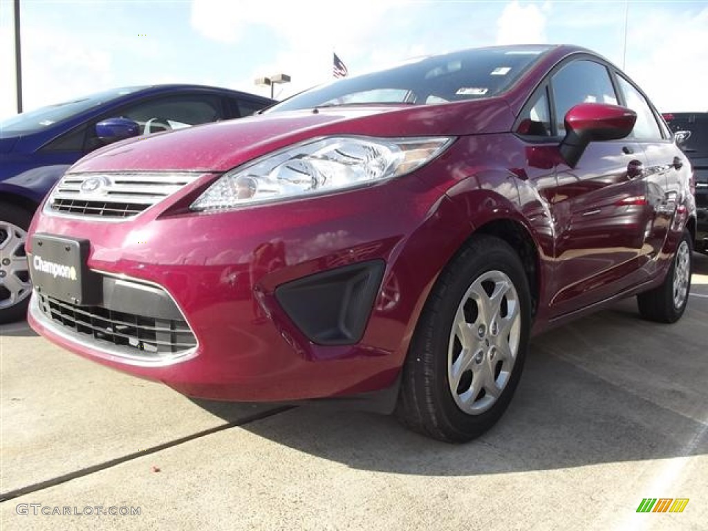 2011 Fiesta SE SFE Sedan - Bright Magenta Metallic / Charcoal Black/Blue Cloth photo #1