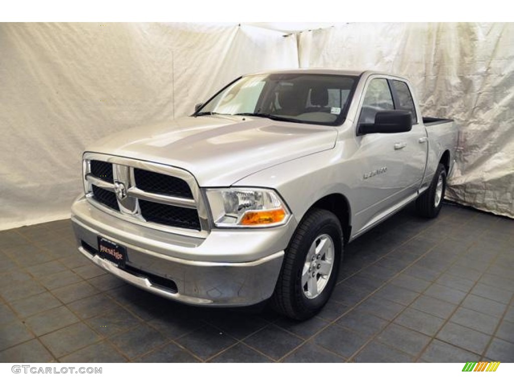 2011 Ram 1500 SLT Quad Cab 4x4 - Bright Silver Metallic / Dark Slate Gray/Medium Graystone photo #1
