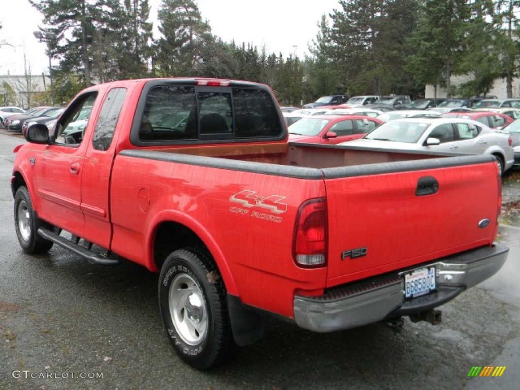 2000 F150 XLT Extended Cab 4x4 - Bright Red / Medium Graphite photo #4
