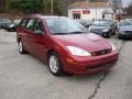 2002 Sangria Red Metallic Ford Focus SE Wagon  photo #1