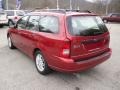 2002 Sangria Red Metallic Ford Focus SE Wagon  photo #4
