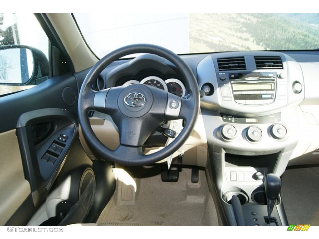 2011 RAV4 I4 4WD - Black Forest Metallic / Sand Beige photo #11