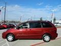 2010 Salsa Red Pearl Toyota Sienna LE  photo #6