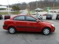 Tropical Red - Rio LX Sedan Photo No. 6