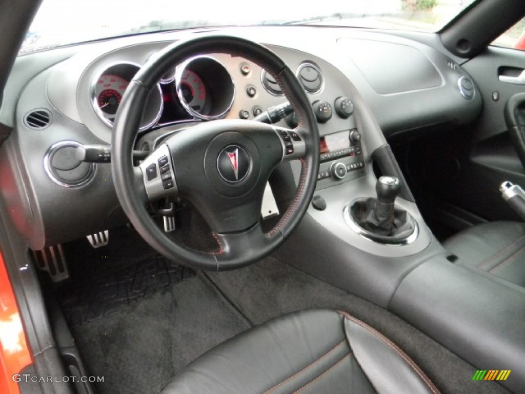 2009 Pontiac Solstice Street Edition Roadster Ebony/Red Stitching Dashboard Photo #58317468