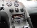 2009 Pontiac Solstice Ebony/Red Stitching Interior Controls Photo