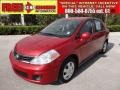 2011 Red Brick Nissan Versa 1.8 S Sedan  photo #1