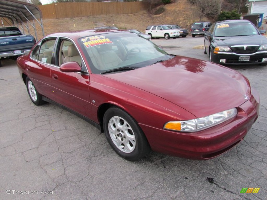Ruby Red Metallic Oldsmobile Intrigue