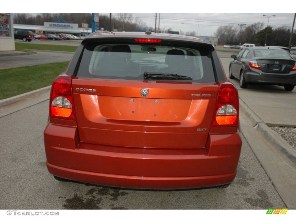 2010 Caliber SXT - Sunburst Orange Pearl / Dark Slate Gray photo #5