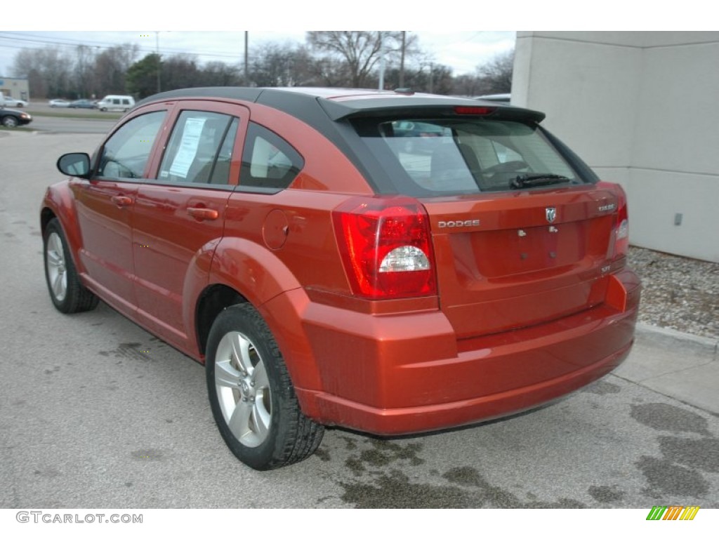 2010 Caliber SXT - Sunburst Orange Pearl / Dark Slate Gray photo #6