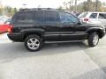2004 Brillant Black Crystal Pearl Jeep Grand Cherokee Overland 4x4  photo #13