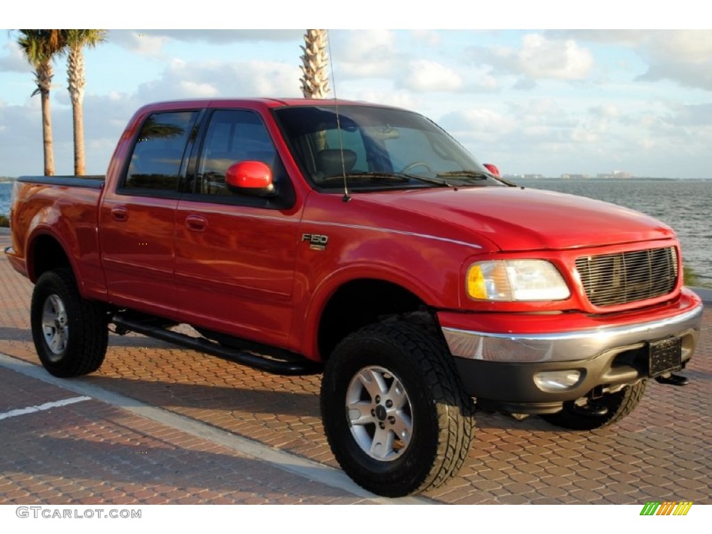 2002 F150 Lariat SuperCrew 4x4 - Bright Red / Medium Parchment photo #1