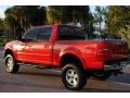 2002 Bright Red Ford F150 Lariat SuperCrew 4x4  photo #7