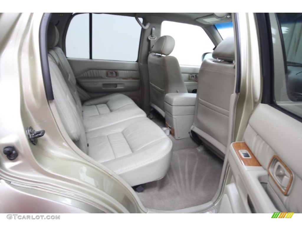 2002 QX4  - Golden Sand Metallic / Stone Beige photo #31