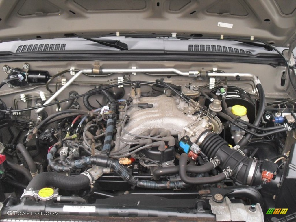 2004 Nissan Xterra XE 4x4 3.3 Liter SOHC 12-Valve V6 Engine Photo #58526549