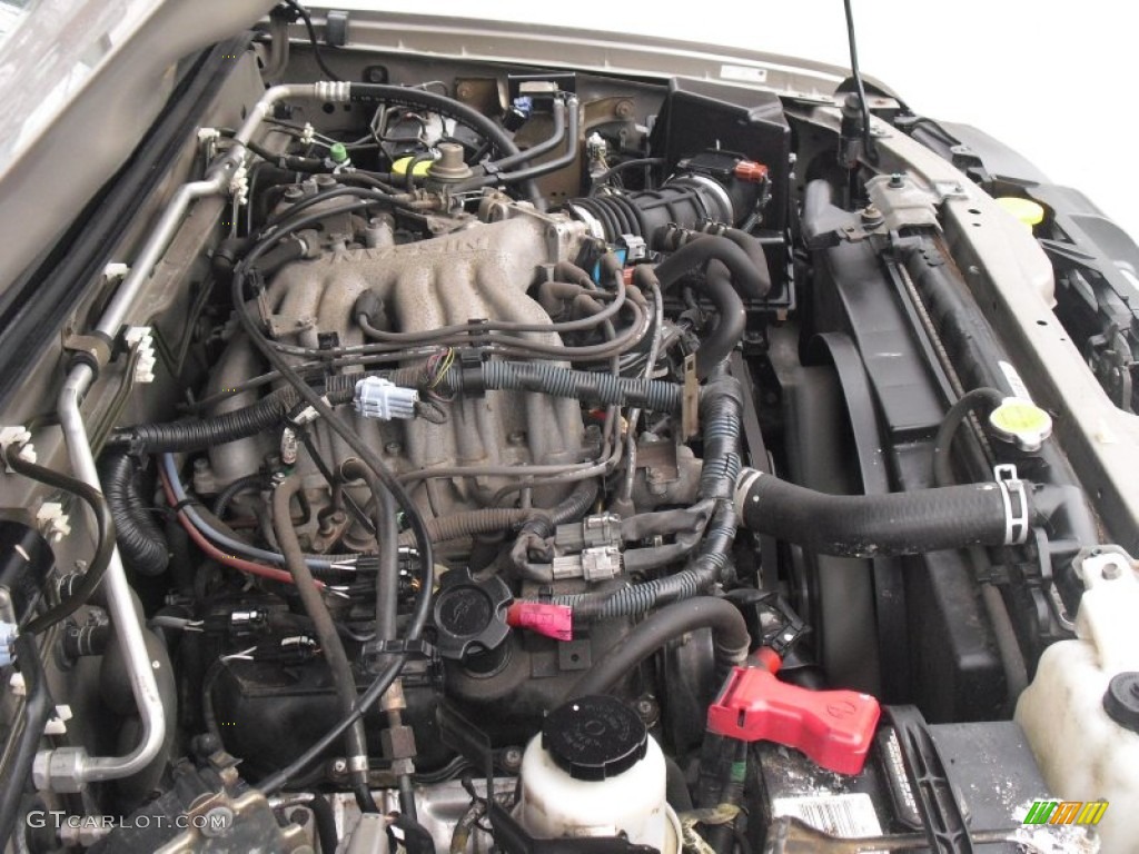 2004 Nissan Xterra XE 4x4 3.3 Liter SOHC 12-Valve V6 Engine Photo #58526558