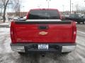 2007 Victory Red Chevrolet Silverado 1500 Work Truck Extended Cab 4x4  photo #5