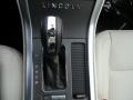2012 Lincoln MKS Cashmere Interior Transmission Photo