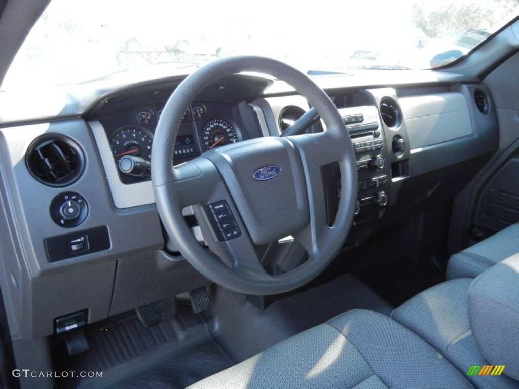 2010 F150 STX Regular Cab - Tuxedo Black / Medium Stone photo #16