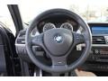 2010 BMW X5 M Bamboo Beige Interior Steering Wheel Photo