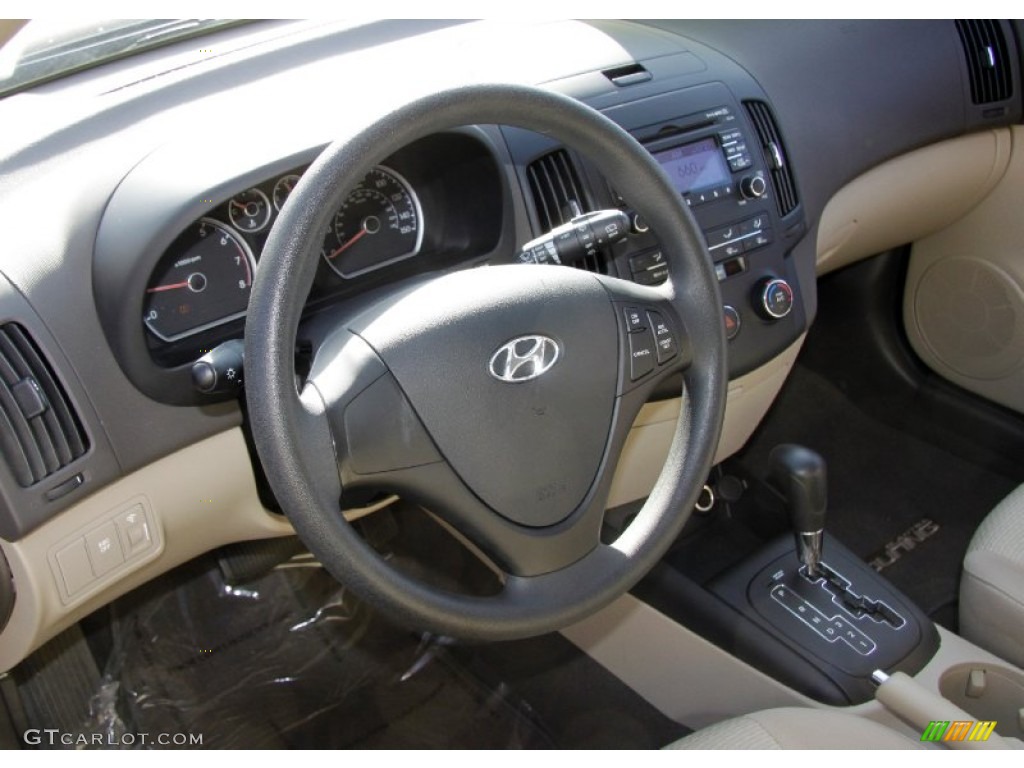 2010 Elantra Touring GLS - Ebony Black / Beige photo #12