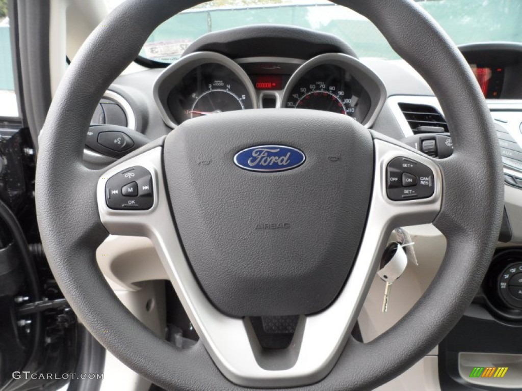 2012 Ford Fiesta SE SFE Hatchback Light Stone/Charcoal Black Steering Wheel Photo #58658326