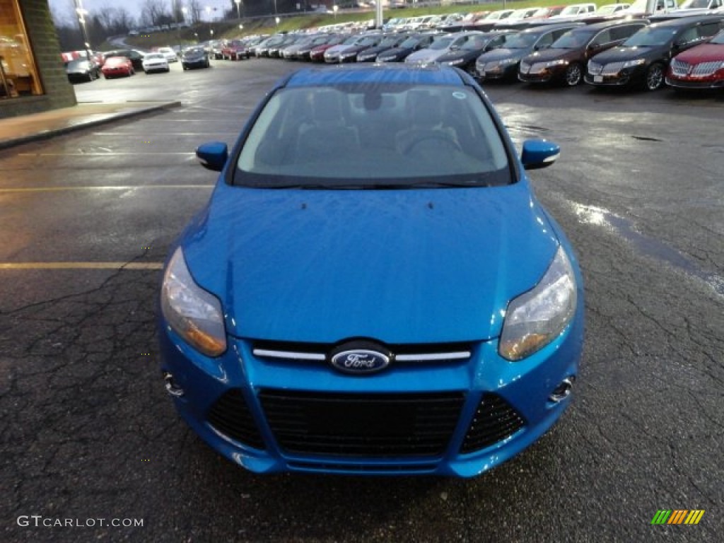 Blue Candy Metallic 2012 Ford Focus Titanium Sedan Exterior Photo #58666571