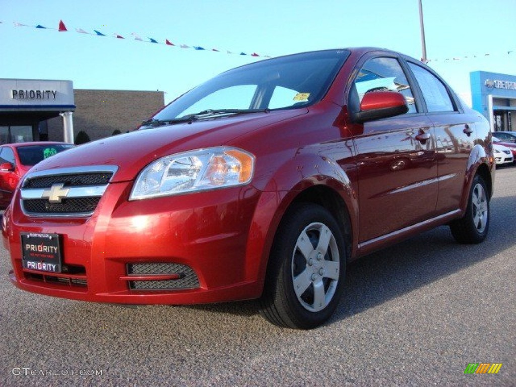 2010 Aveo LT Sedan - Sport Red / Charcoal photo #1