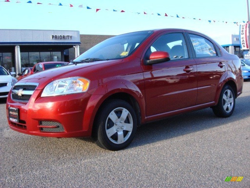 2010 Aveo LT Sedan - Sport Red / Charcoal photo #2