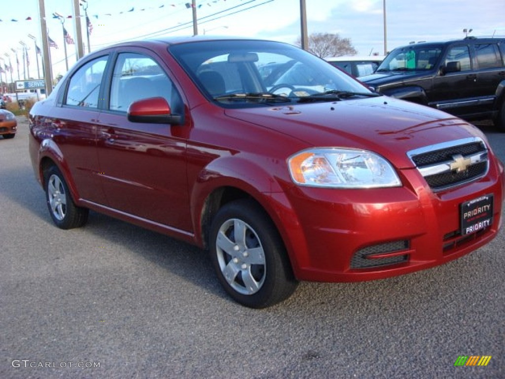 2010 Aveo LT Sedan - Sport Red / Charcoal photo #7