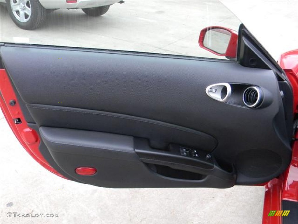 2006 Nissan 350Z Coupe Carbon Black Door Panel Photo #58688777