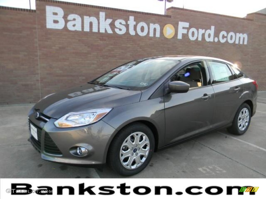 2012 Focus SE Sedan - Sterling Grey Metallic / Stone photo #1