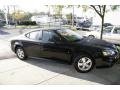 2008 Black Pontiac Grand Prix Sedan  photo #3