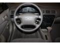 2002 Chevrolet Prizm Light Neutral Interior Steering Wheel Photo