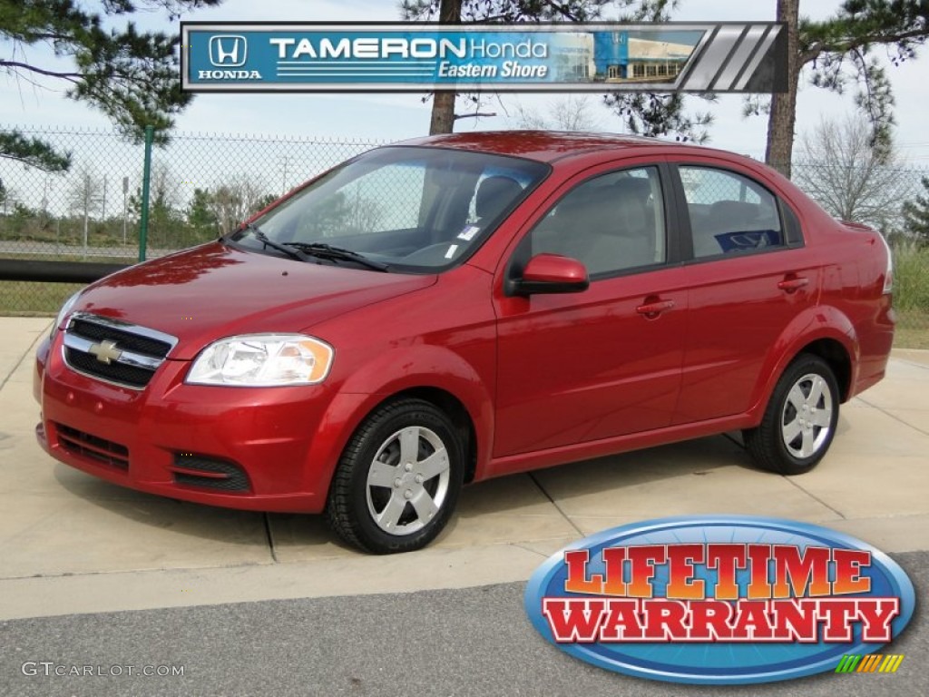 2010 Aveo LT Sedan - Sport Red / Charcoal photo #1