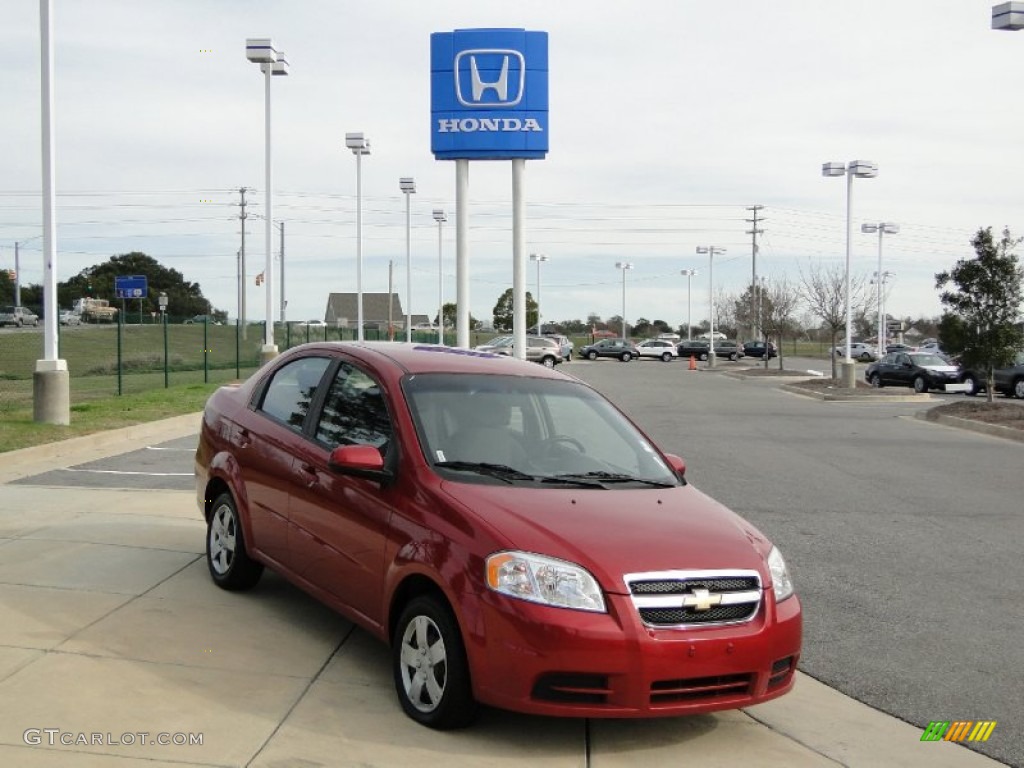 2010 Aveo LT Sedan - Sport Red / Charcoal photo #2