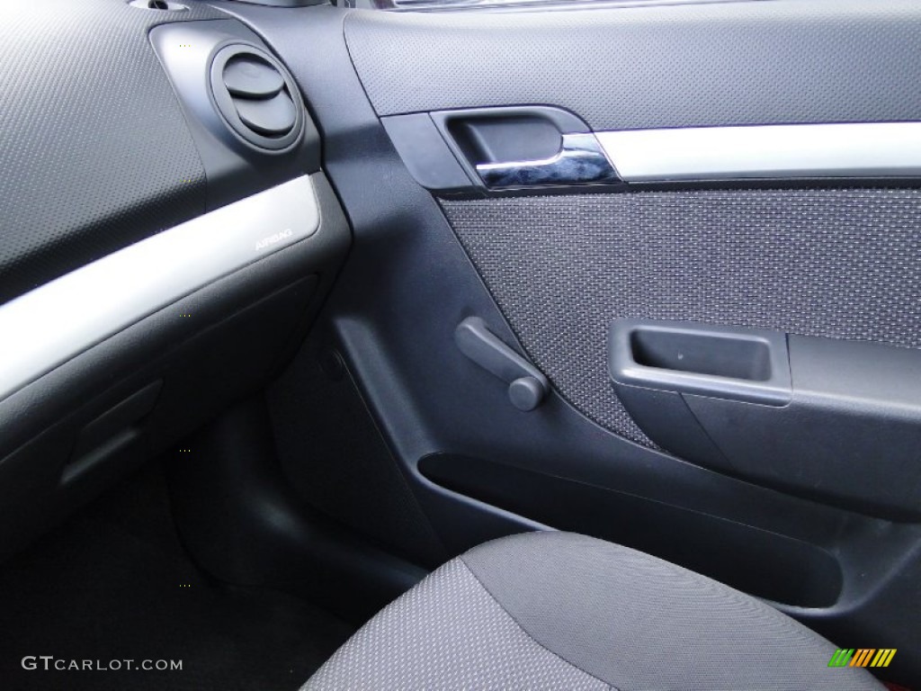 2010 Aveo LT Sedan - Sport Red / Charcoal photo #21