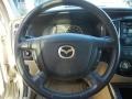 2005 Mazda Tribute Medium Pebble Beige Interior Steering Wheel Photo
