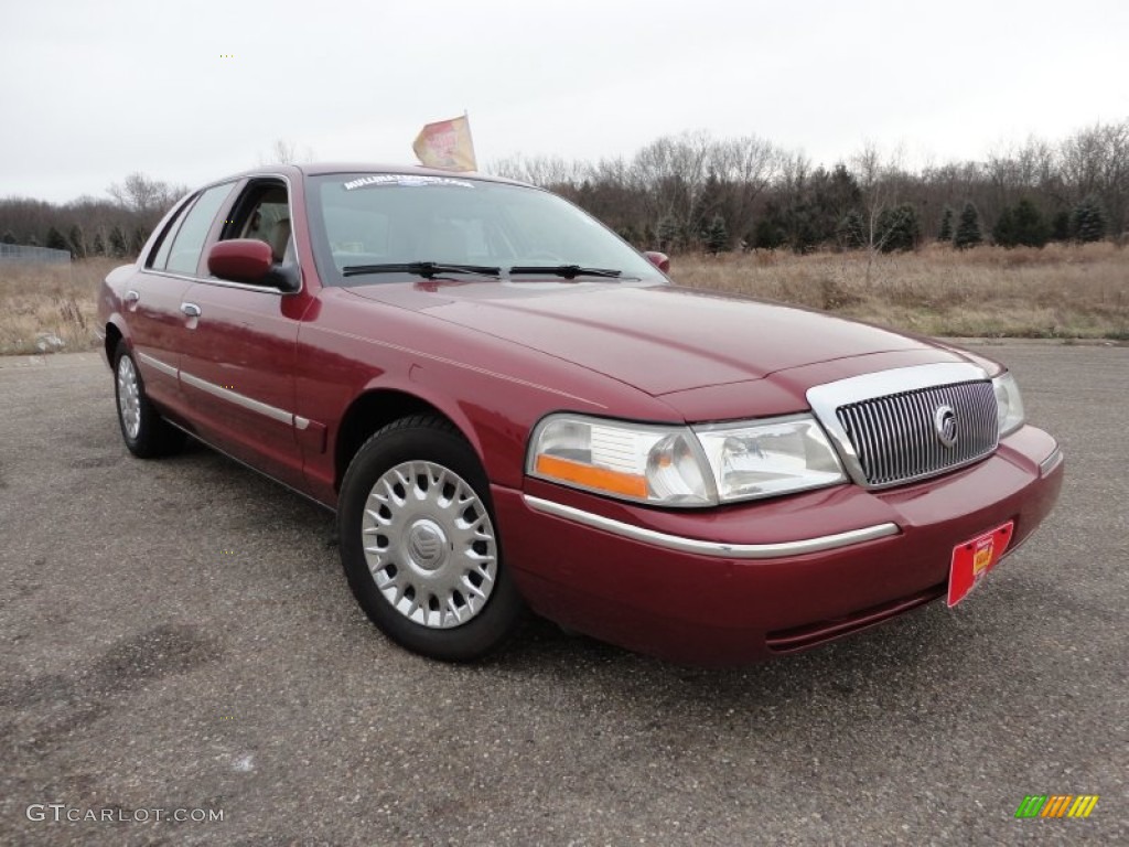 2003 Grand Marquis GS - Matador Red Metallic / Light Flint photo #1