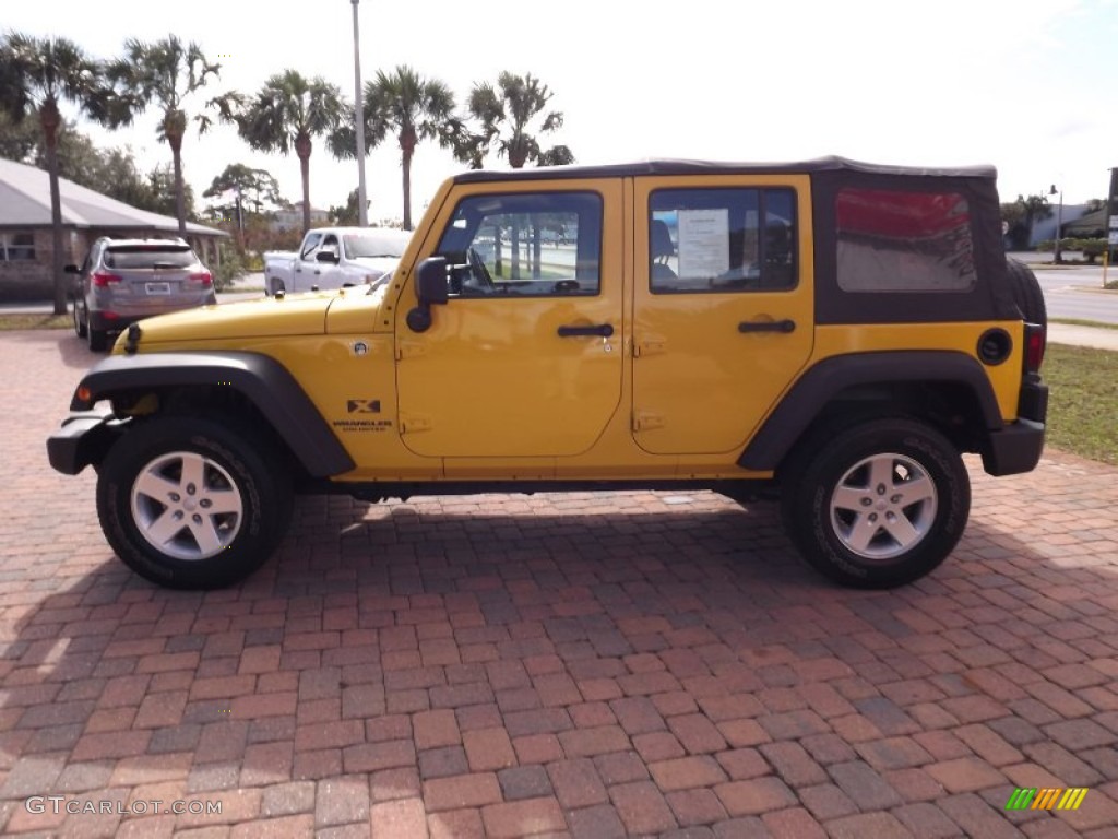 Detonator Yellow 2009 Jeep Wrangler Unlimited X 4x4 Exterior Photo #58916714