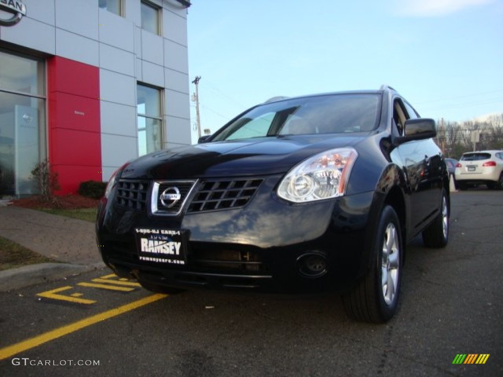 2009 Rogue SL AWD - Wicked Black / Gray photo #1