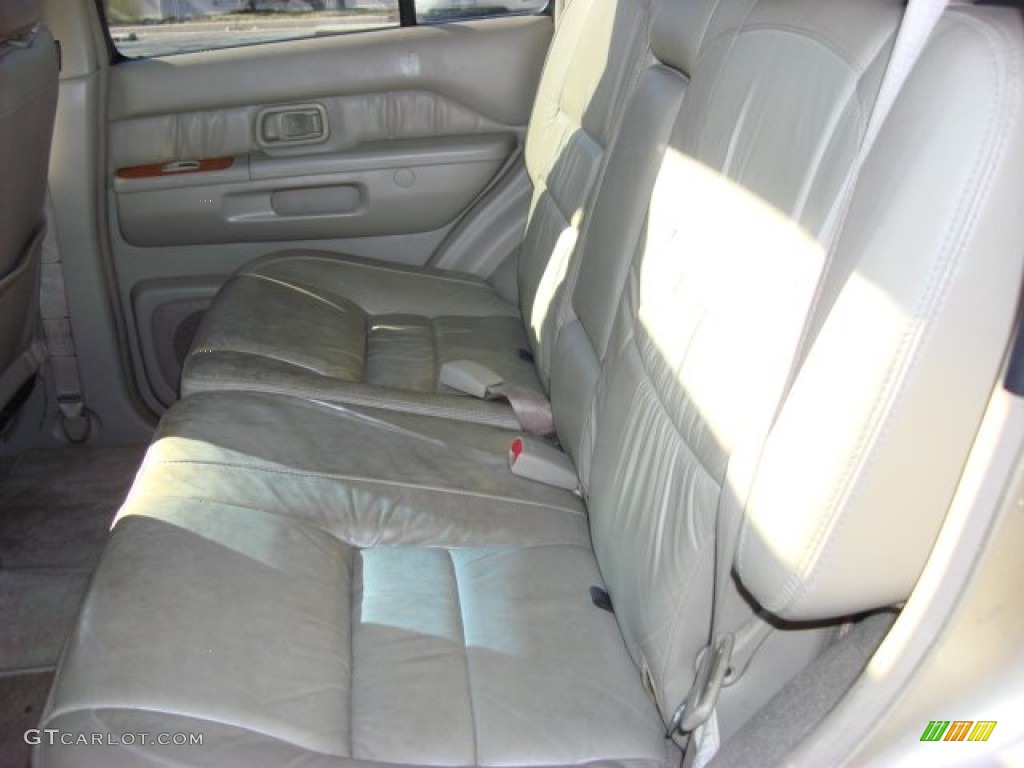 2002 QX4 4x4 - Golden Sand Metallic / Stone Beige photo #9