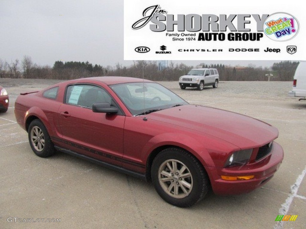 2007 Mustang V6 Deluxe Coupe - Redfire Metallic / Light Graphite photo #1