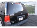 2004 Black Ford Explorer XLS 4x4  photo #17